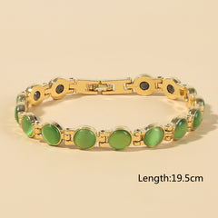 🌈✨【🔥Artículo de gran venta-1 pieza 25€】Elegante pulsera magnética con piedras de ojo de gato doradas